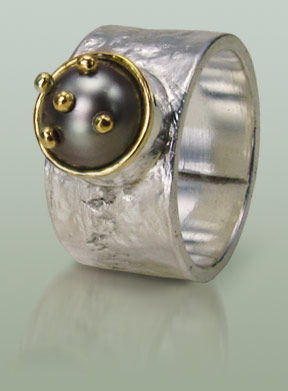 Silver ring with black pearl